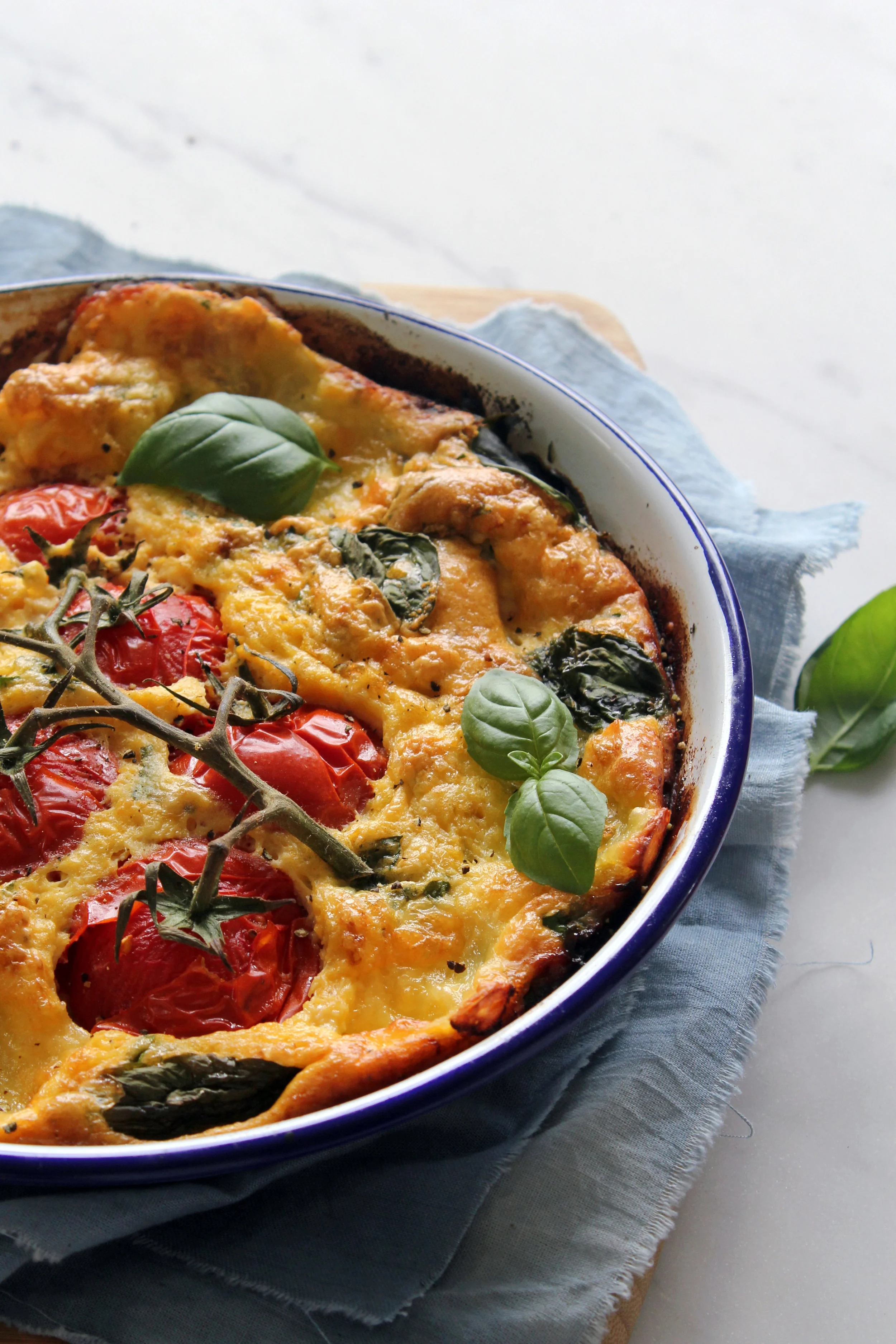 Crustless quiche w/ roasted vine tomatoes, basil &amp; two cheeses