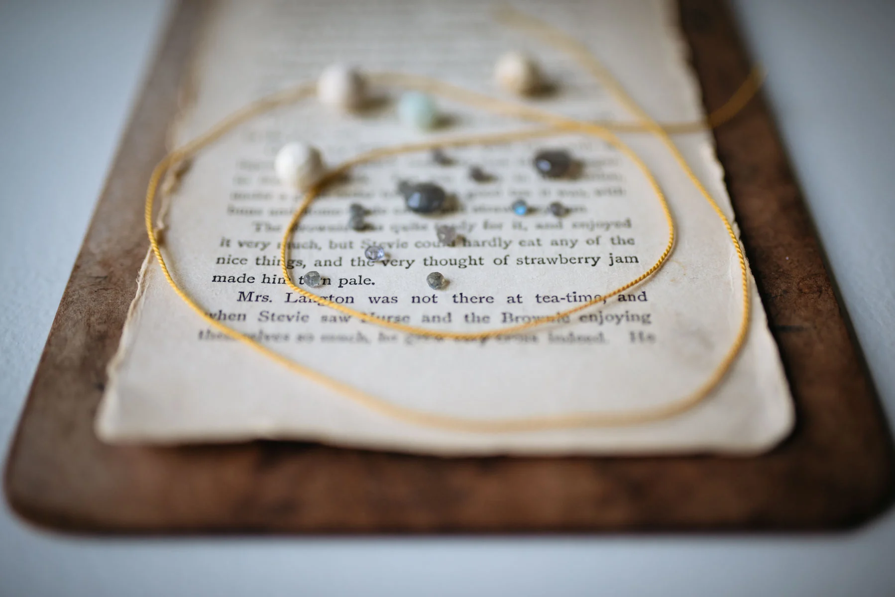 The grey & iridescent beads above are Labradorite. I love Labradorite because it's a picky or selective stone. Most of the time it appears gray. But when you pair it with the right beads it shines. You get beautiful flashes of blue & green. It's so much fun figuring this stone out and what makes it come alive. 