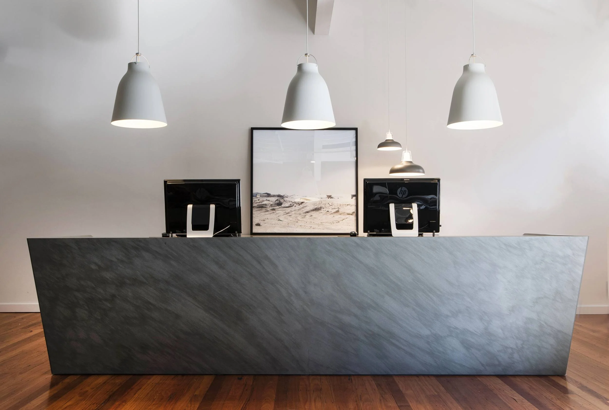 The reception desk at Corporate Culture made from Bedonia stone from Artedomus and designed by Adam Goodrum.
