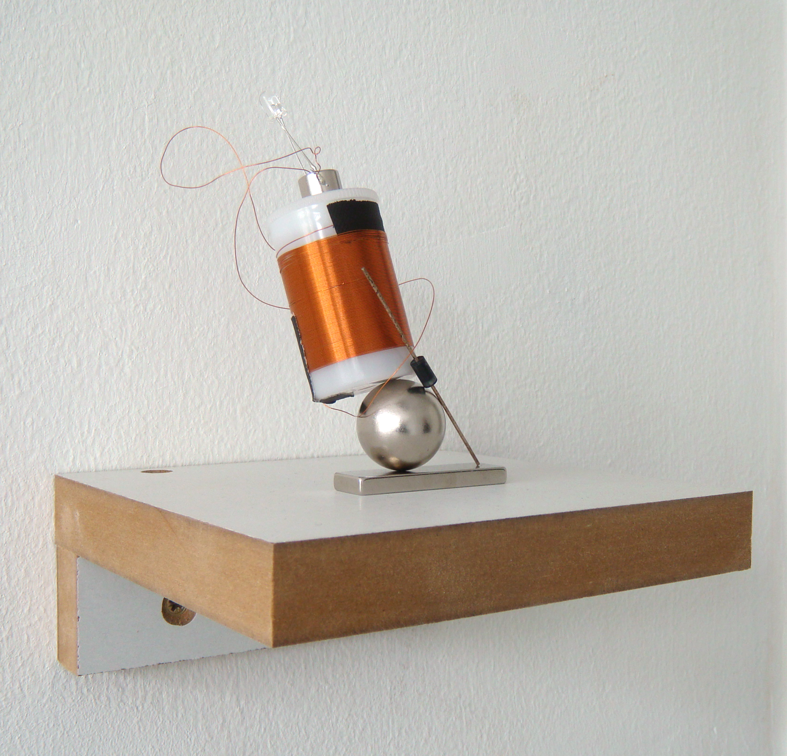 Dave Hullfish Bailey Failed attempt to induce an impulse; attempt to induce a failed impulse 2010 Film canister, magnets, copper wire, diode, red LED bulb 12 x 7 x 6 cm / 4,7 x 2,8 x 2,4 in