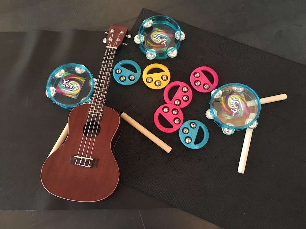 Ukulele, tambourine, rhythm sticks, and other musical instruments for kids musical yoga