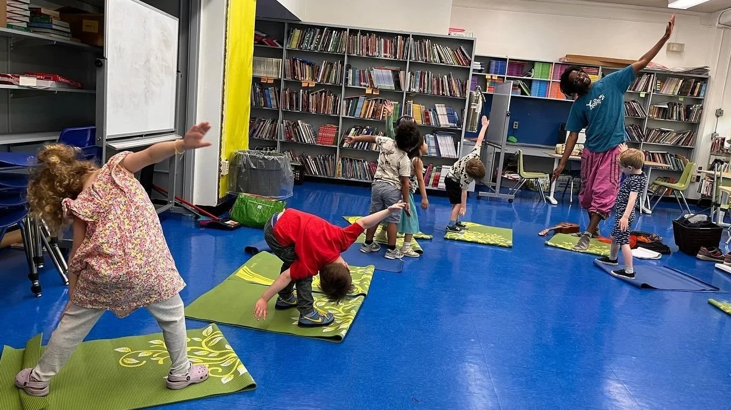 kindergarten kids yoga class warrior pose