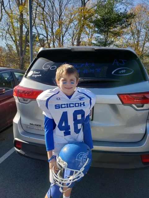 #48 decorating cars before a game vs. Hingham.