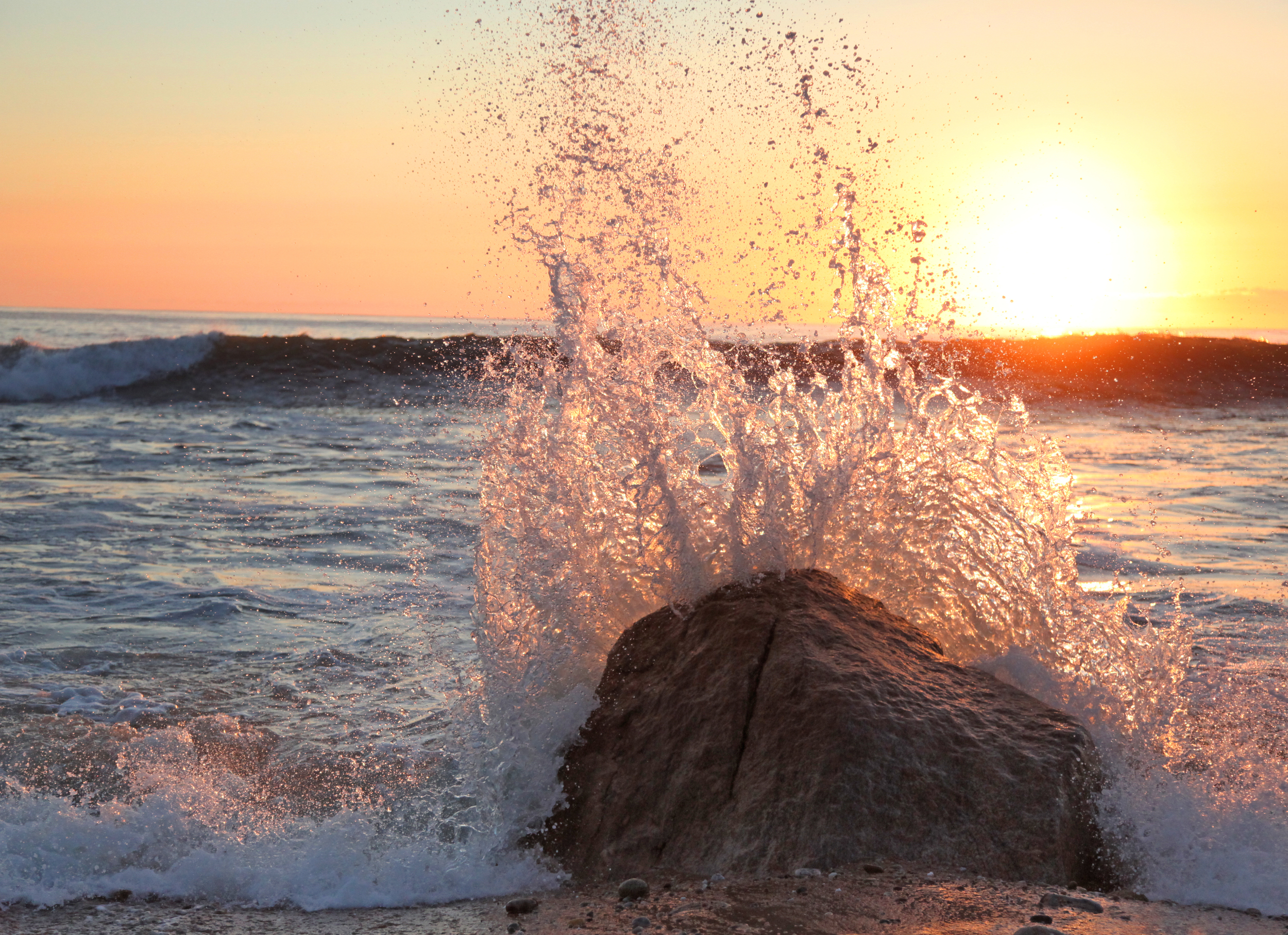 Sunrise - Block Island - 2010 This shot was about 18 hours in the making. I was down at this beach during low tide on the previous day and thought that it might be a nice scene at sunrise. I got up early the next day and hiked back down. Fortunately the tide was just right to get this shot.