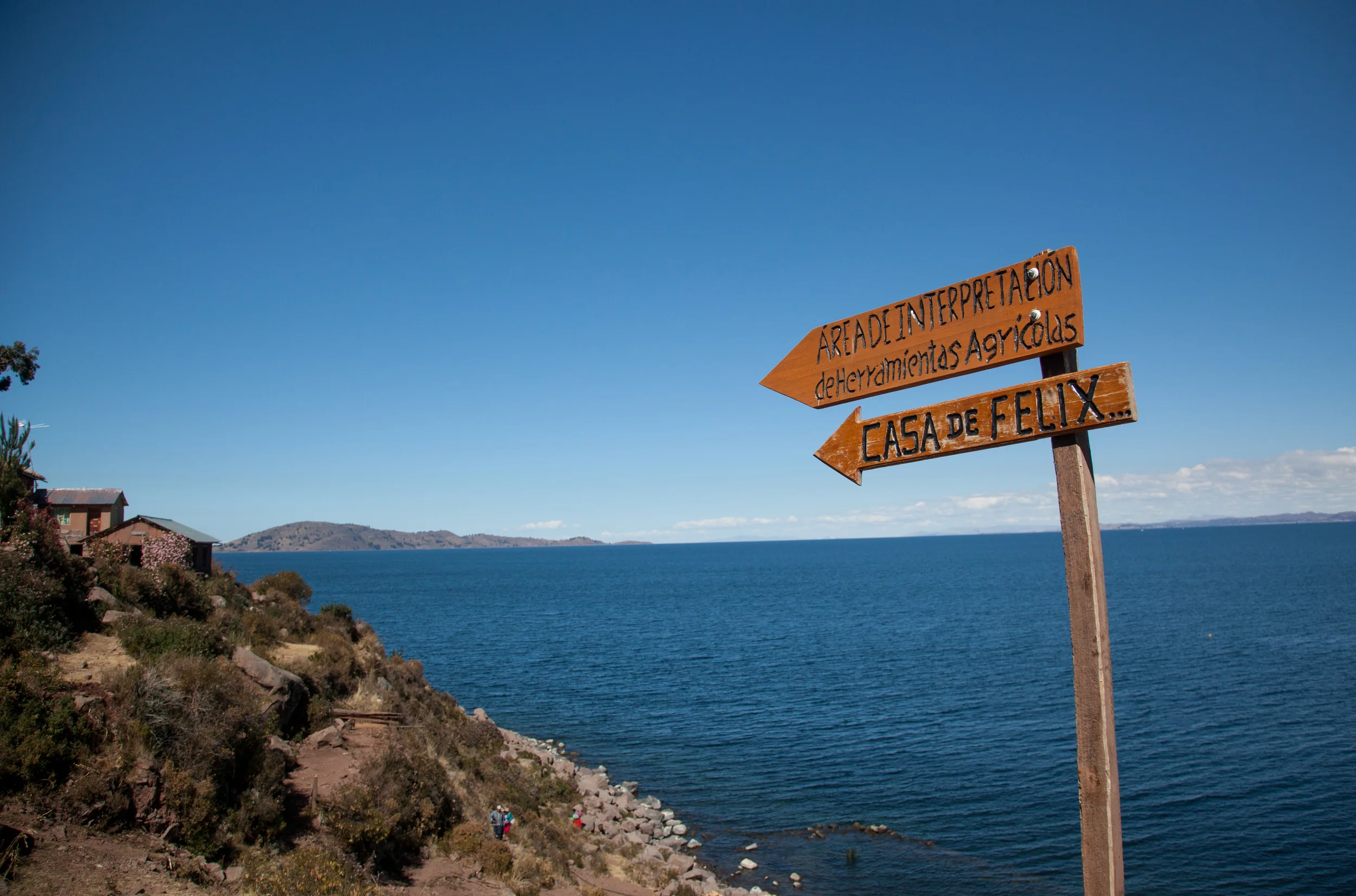 As close to an address as you get in Llachon. The sign that points to Felix Turpo's home, Hospedaje Samary