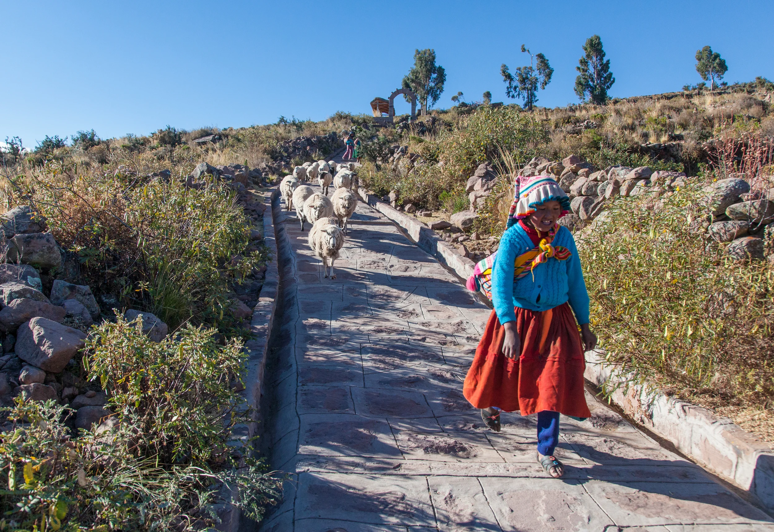 This girl was leading her sheep back to the village as we were heading up.