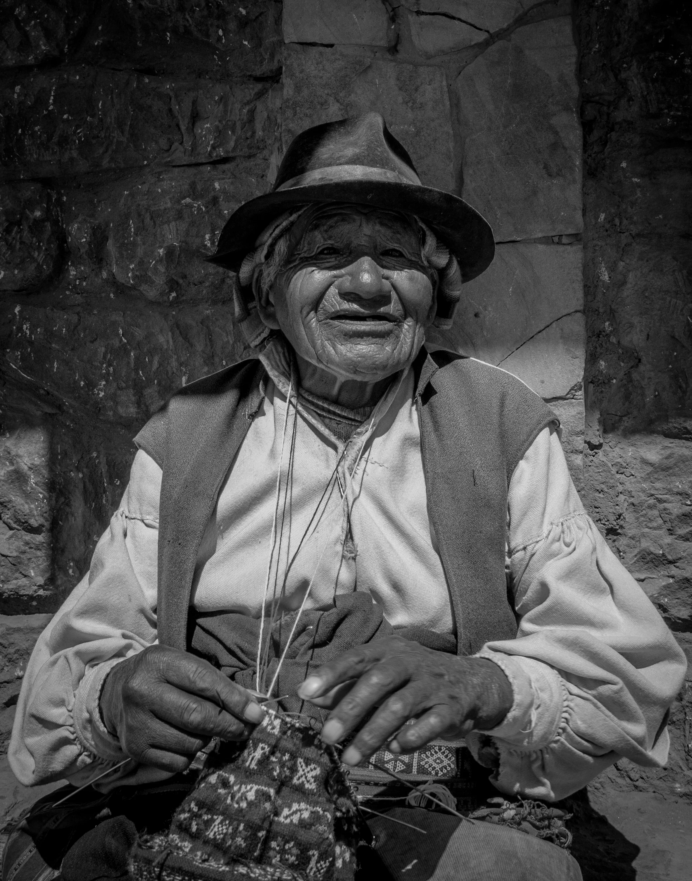 Man knitting a chullo on Taquile