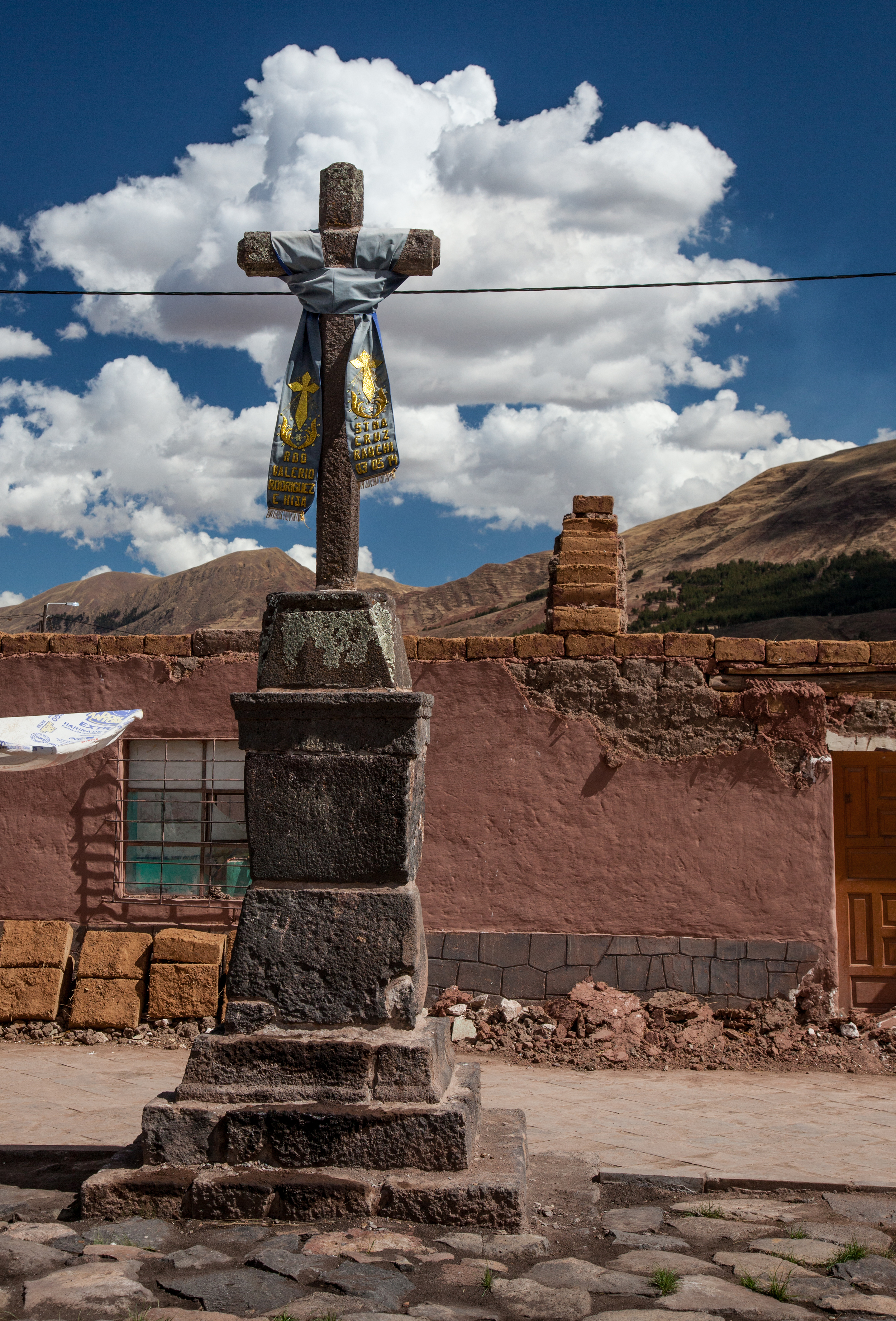 Cross in the small plaza outside of the church