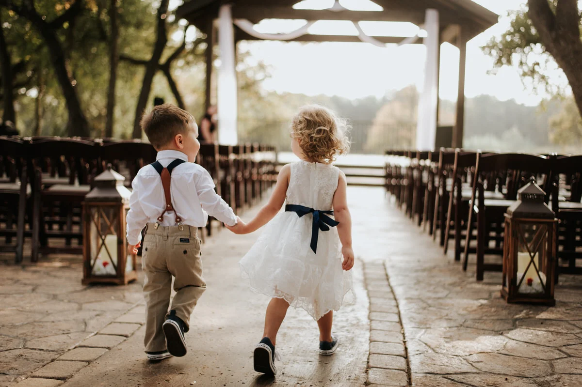 Cute little kids holding hands at Ranch Austin wedding