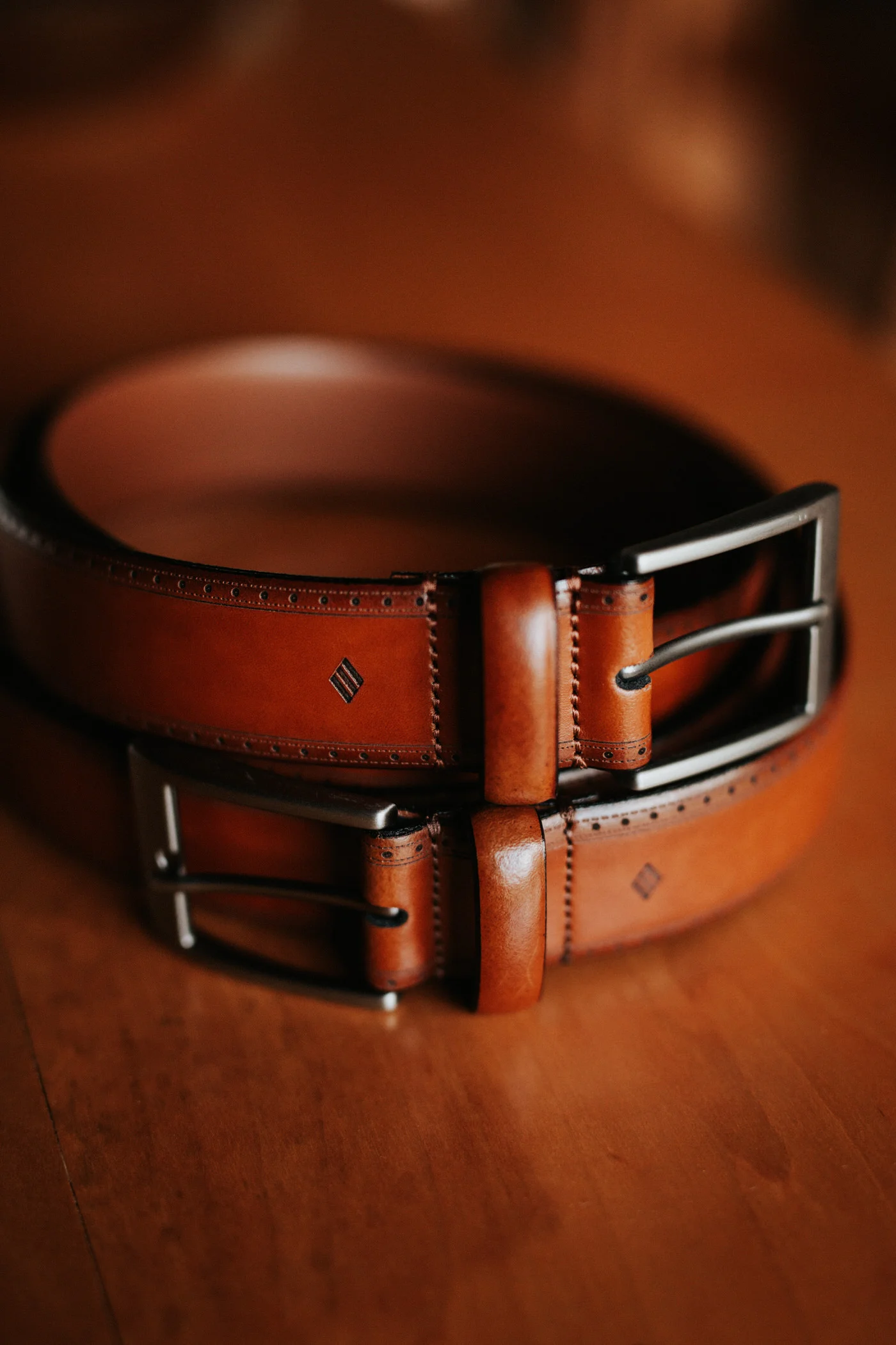 Groom's brown leather belt at Texas hill country wedding