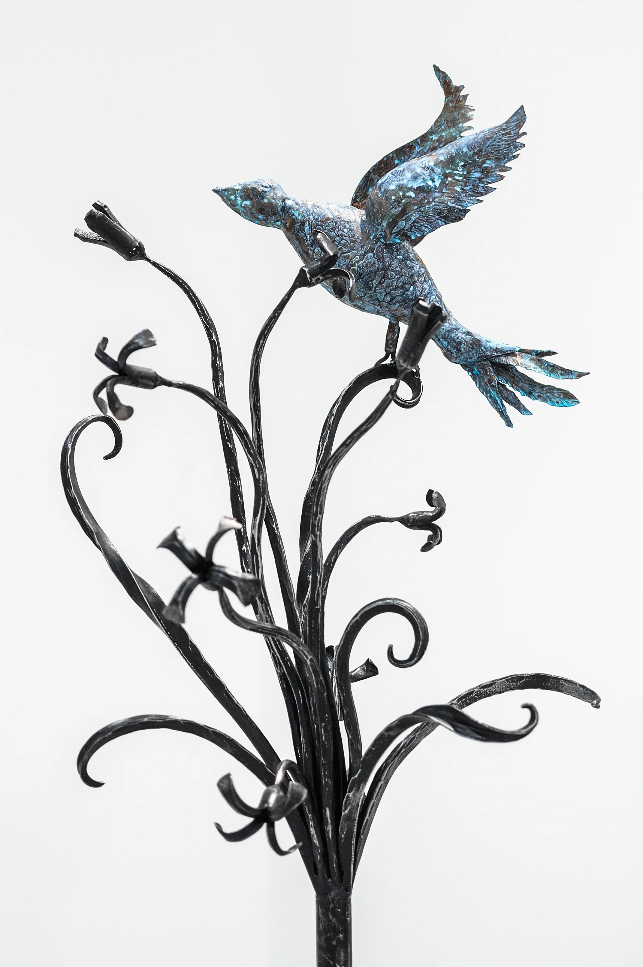 detail Blood of the Earth , 2019, recycled gun and guns barrels, forged steel, rocks, gun dimensions: 60” x 15” x 14”