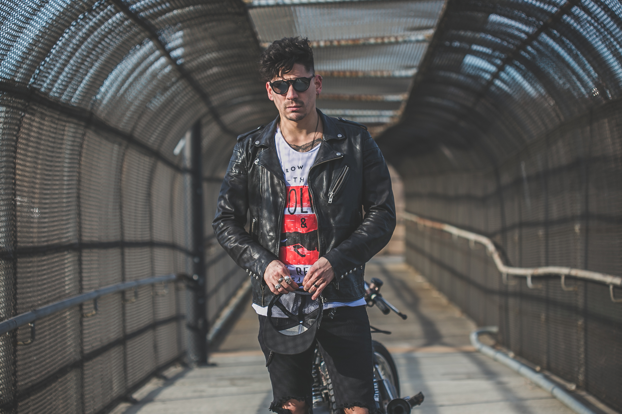 tattooed model in Anchored Apparel with motorcycle