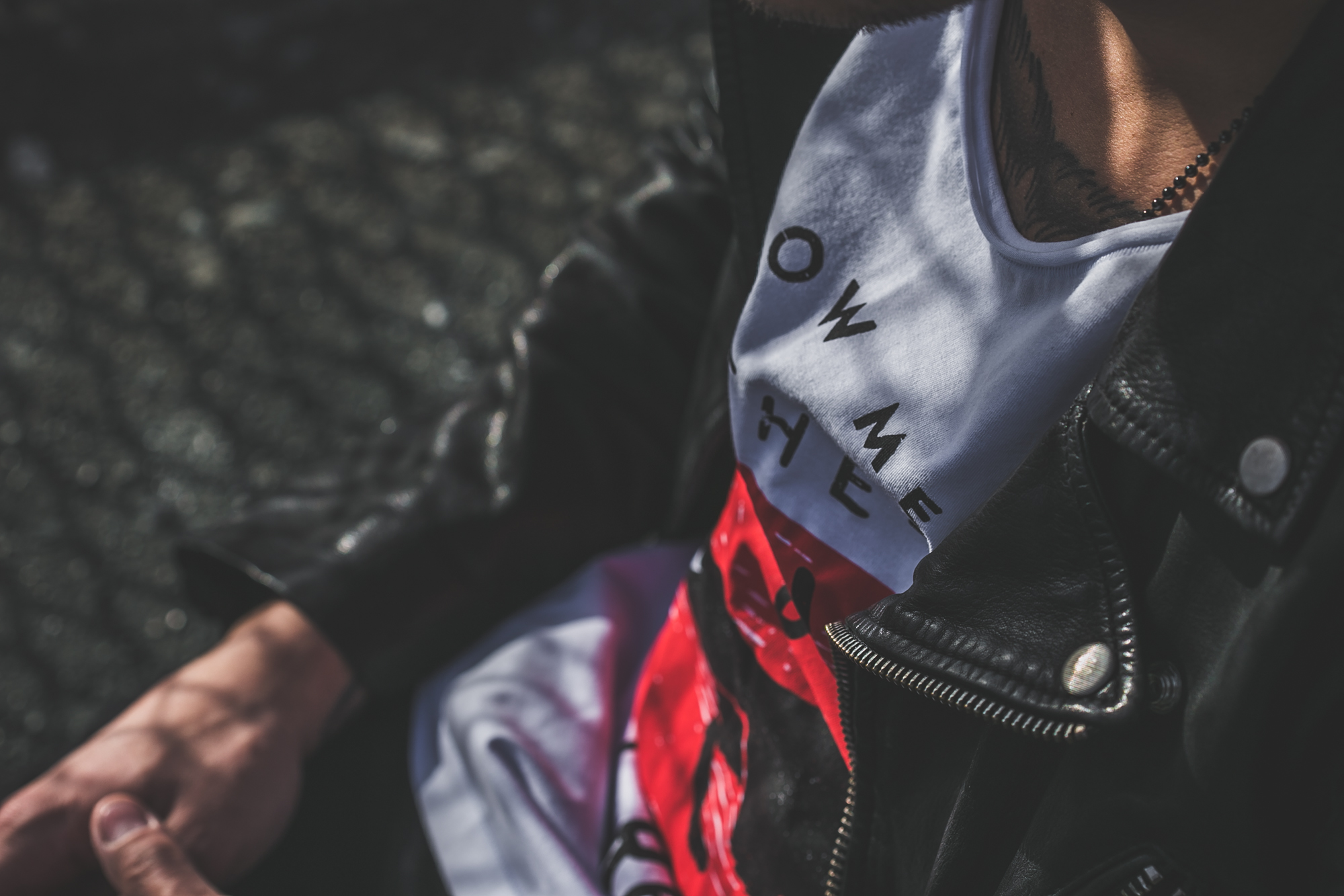 tattooed model in Anchored Apparel with motorcycle