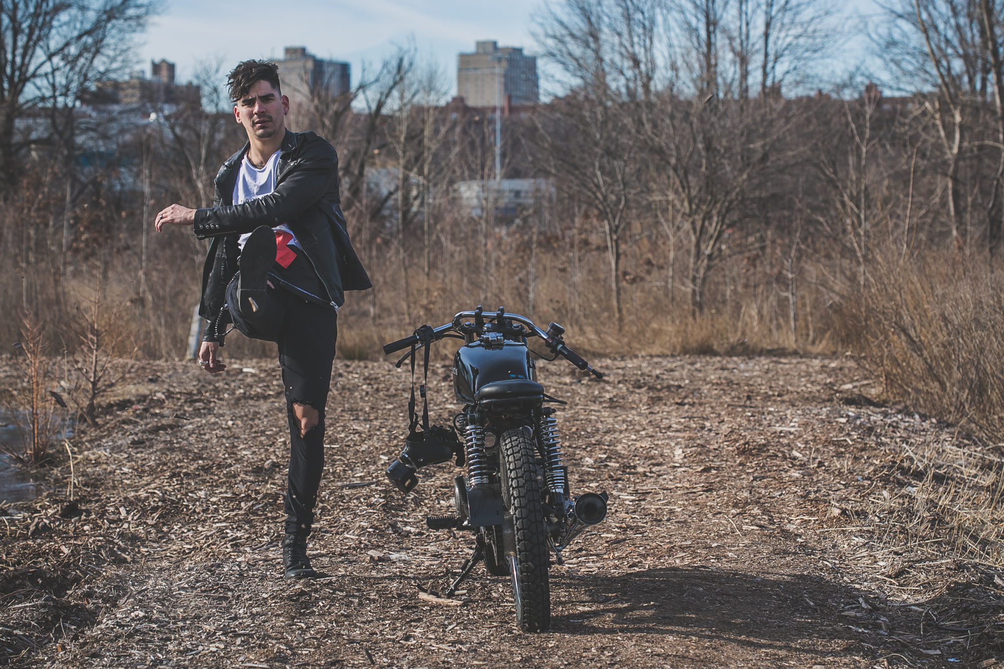 tattooed model in Anchored Apparel with motorcycle