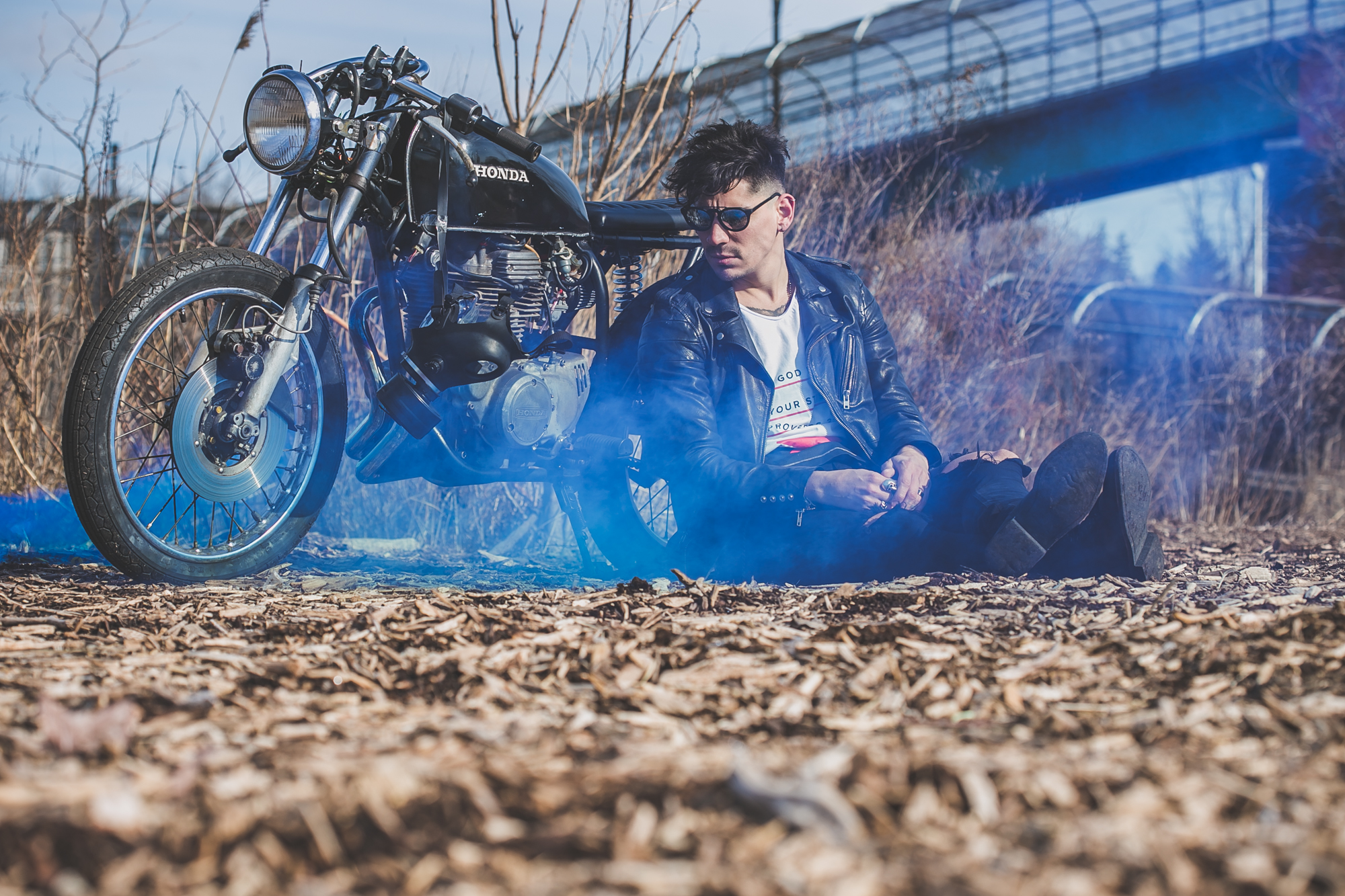 tattooed model in Anchored Apparel with motorcycle