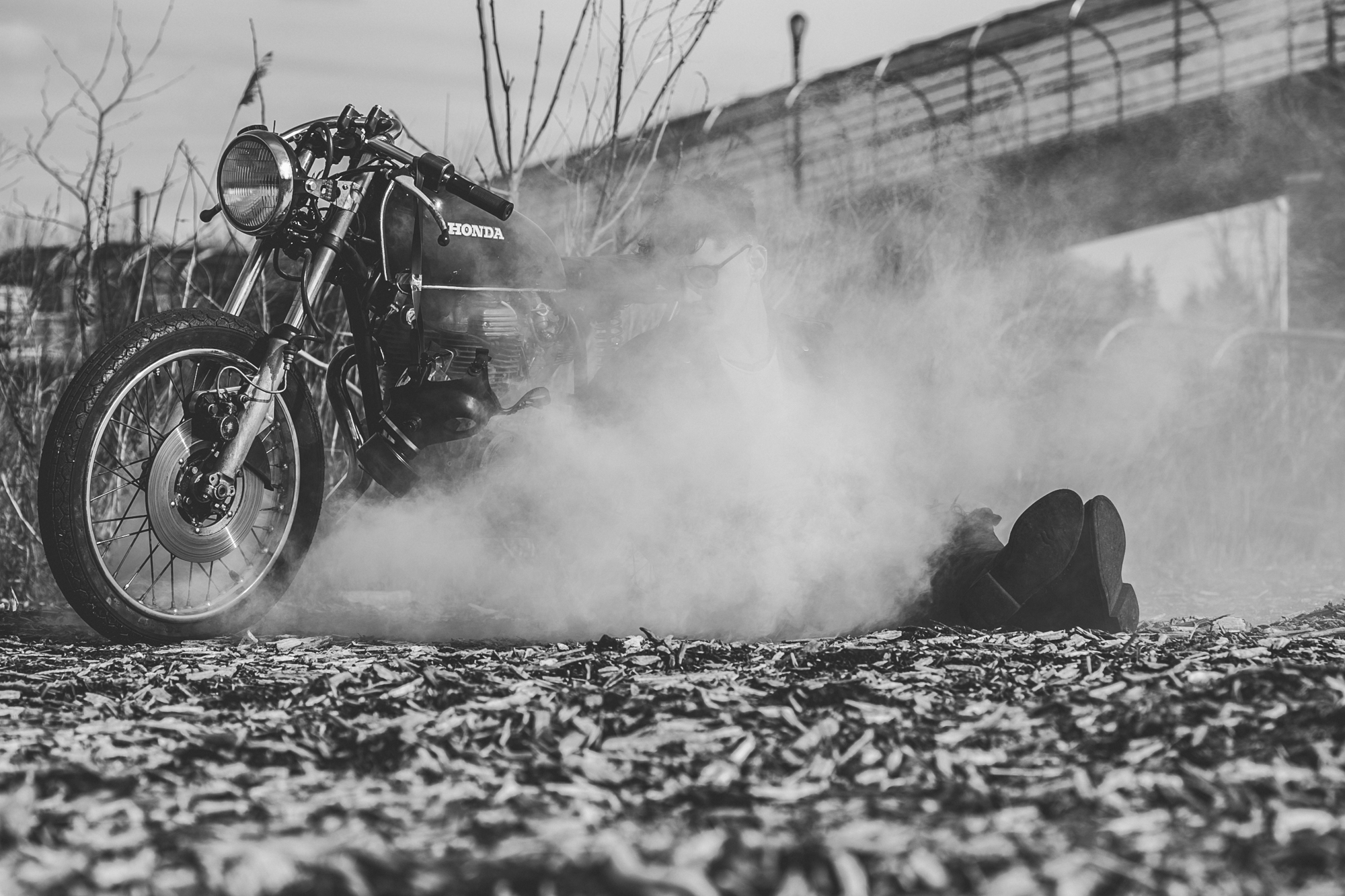 tattooed model in Anchored Apparel with motorcycle