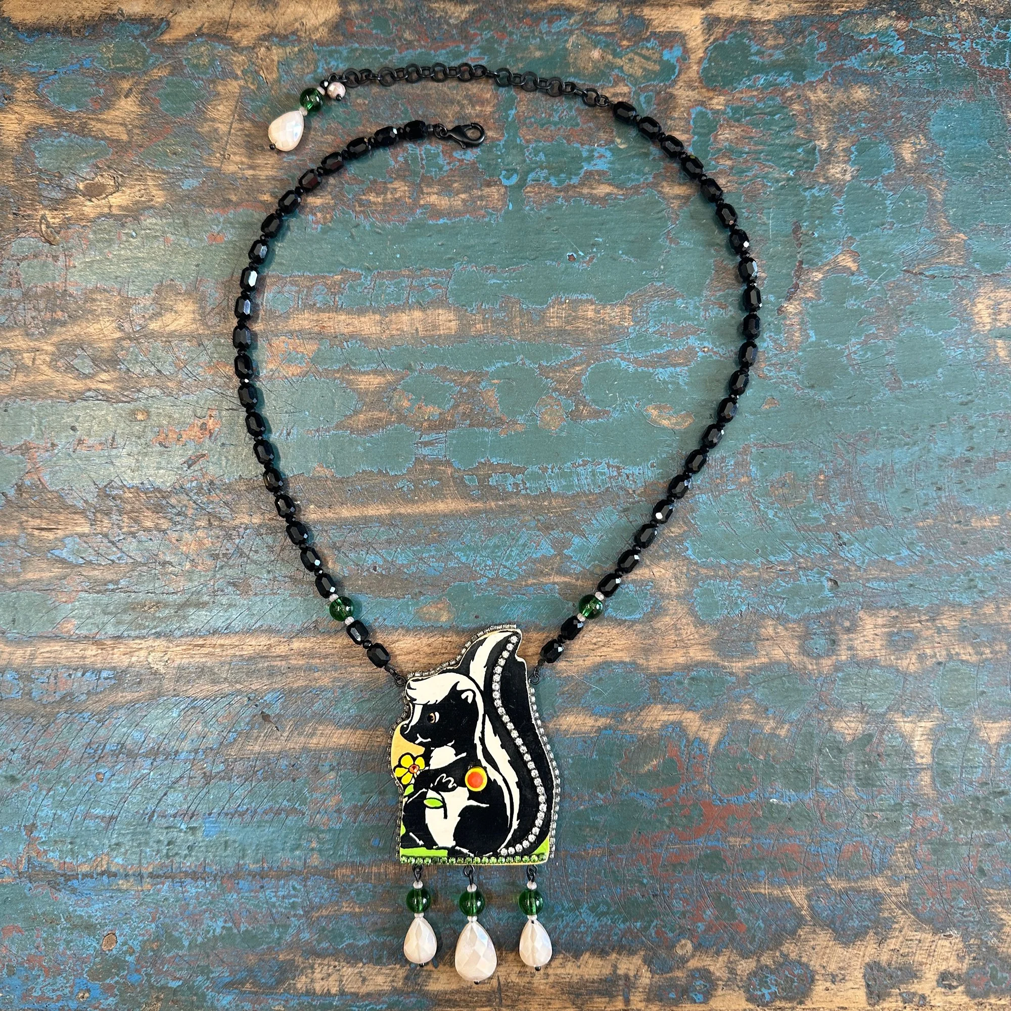 Skunk Puzzle Necklace