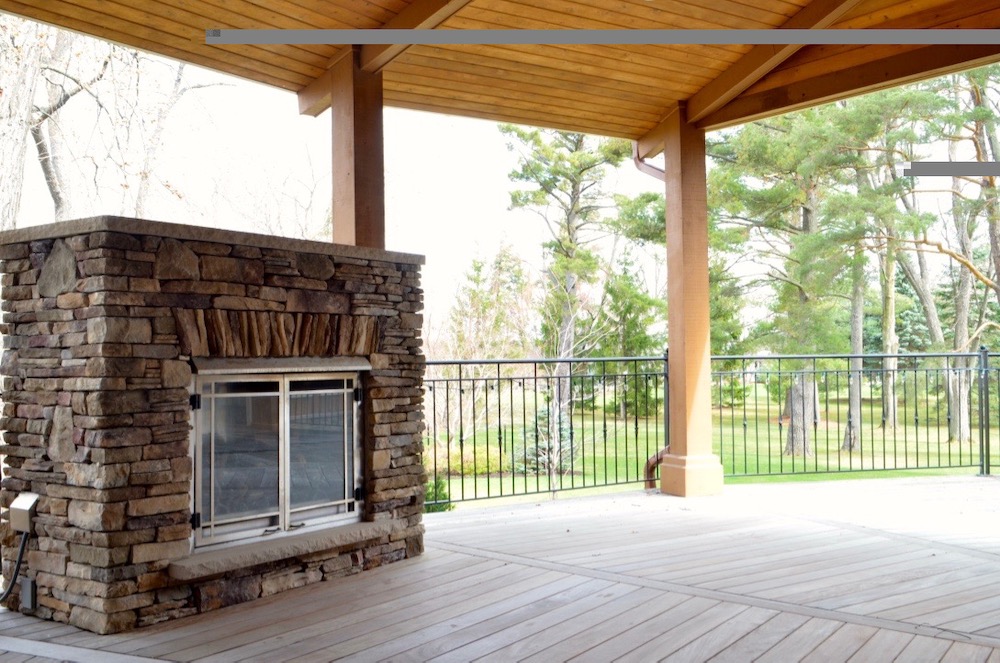 ipe deck segmented outside exterior fireplace tongue and groove cedar ceiling.jpeg