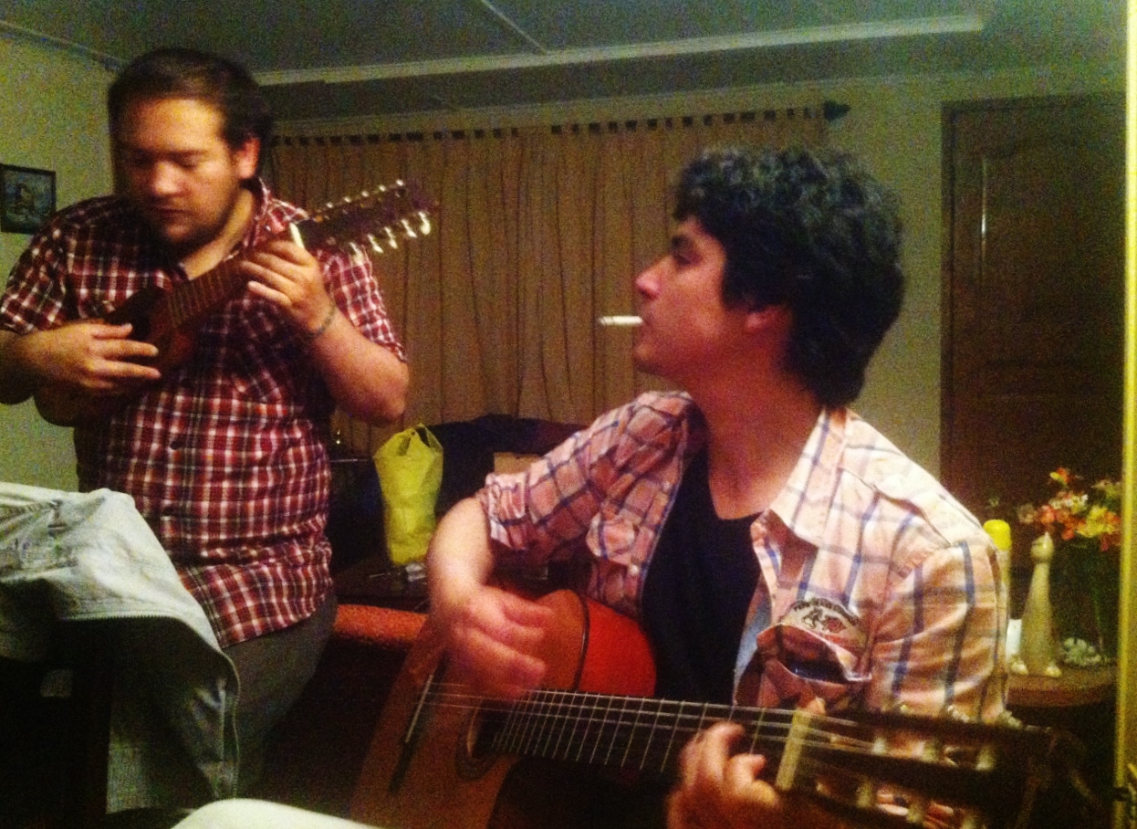  Oscar and our friend "Pelado" playing at a party at Pelado's girlfriend's house. &nbsp;Either Chileans are very musical people or I just happened to meet the ones who like to play music the most 