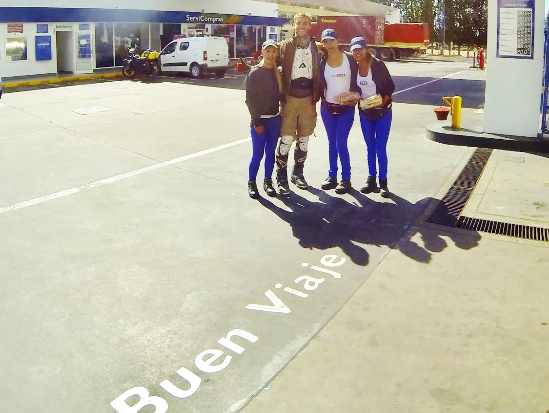 This gas station employs hot girls to walk around in tights and tank tops and sell you things at the pump, for all of you back home wondering how to make buying gas even sexier