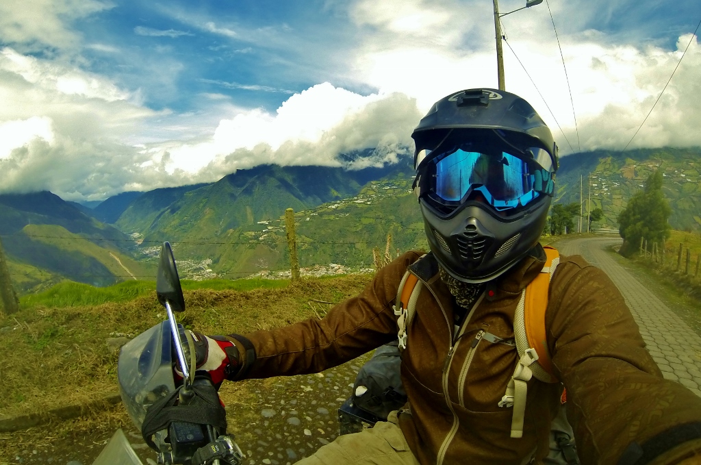Baños, reduced to white specks in the valley below