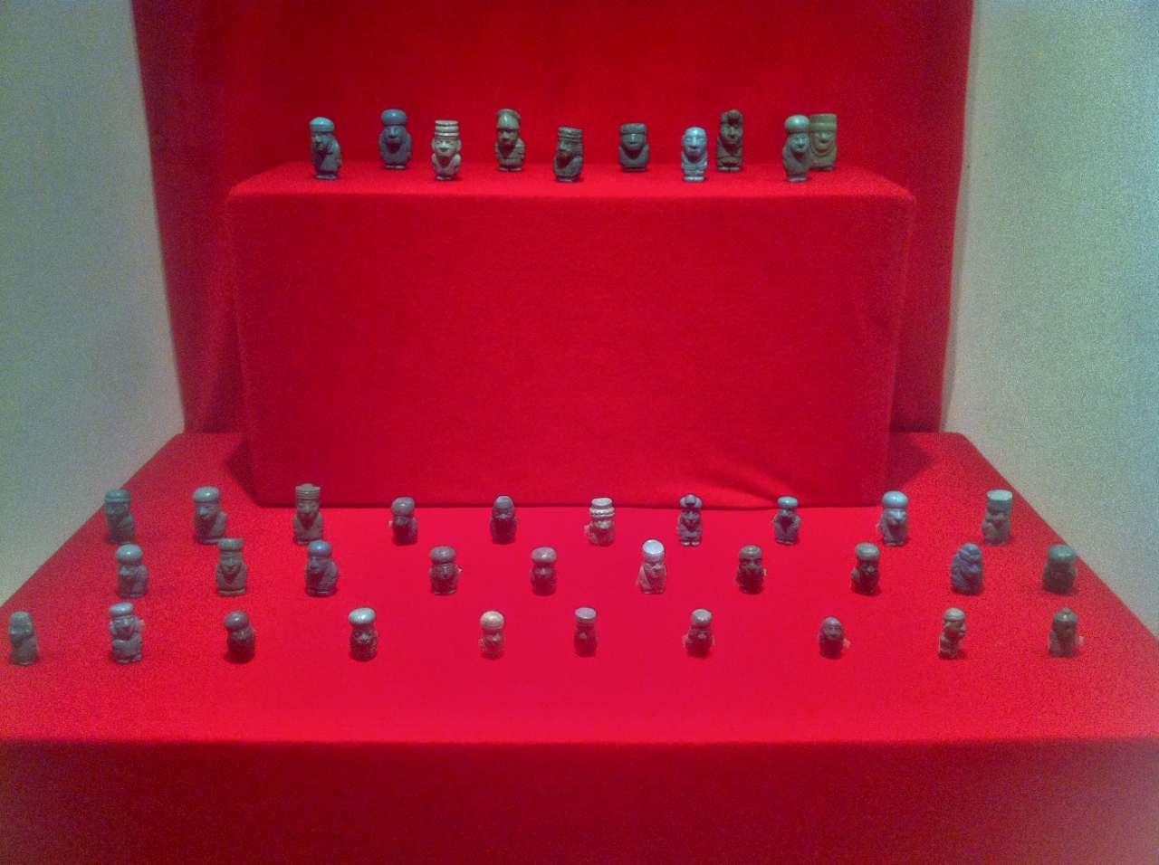 The museum had hundreds of these turquoise figurines. Each one had a distinct face, armor, and weapons, even though each figurine stood no taller than a quarter.