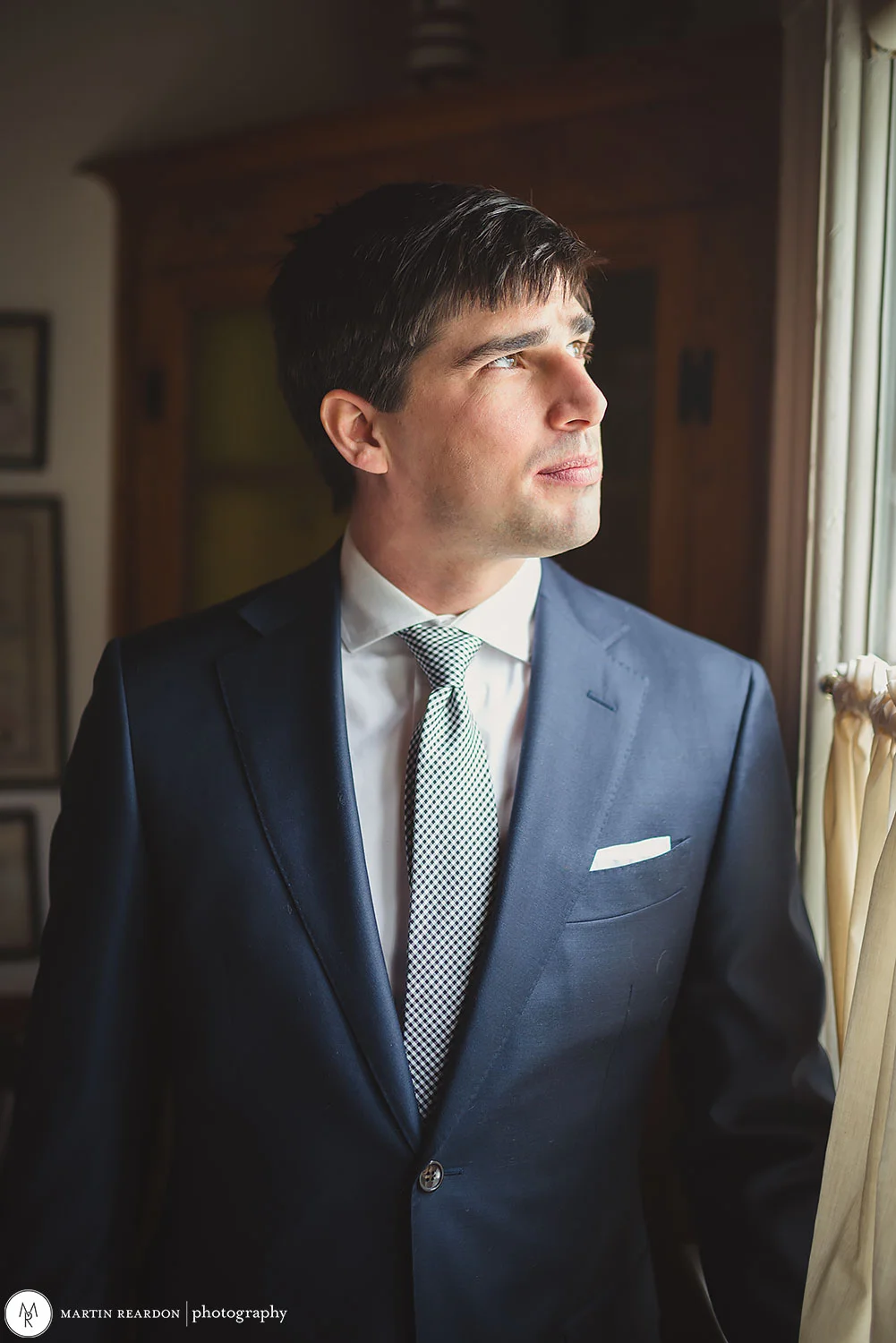 4-Groom-Portrait-Near-Window.jpg