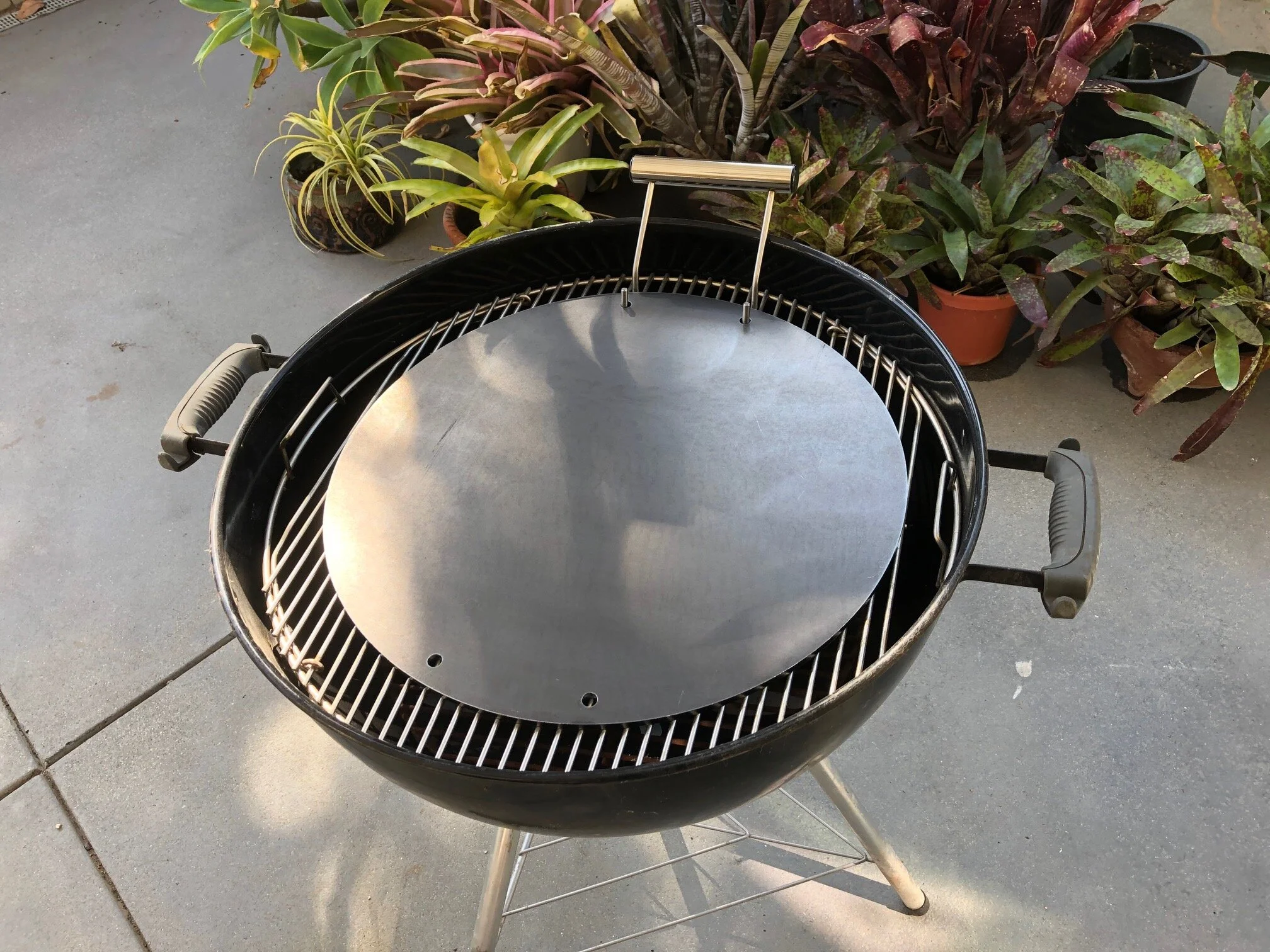 The 18” diameter Ballistic Mojoe griddle for use in most backyard BBQ grills.