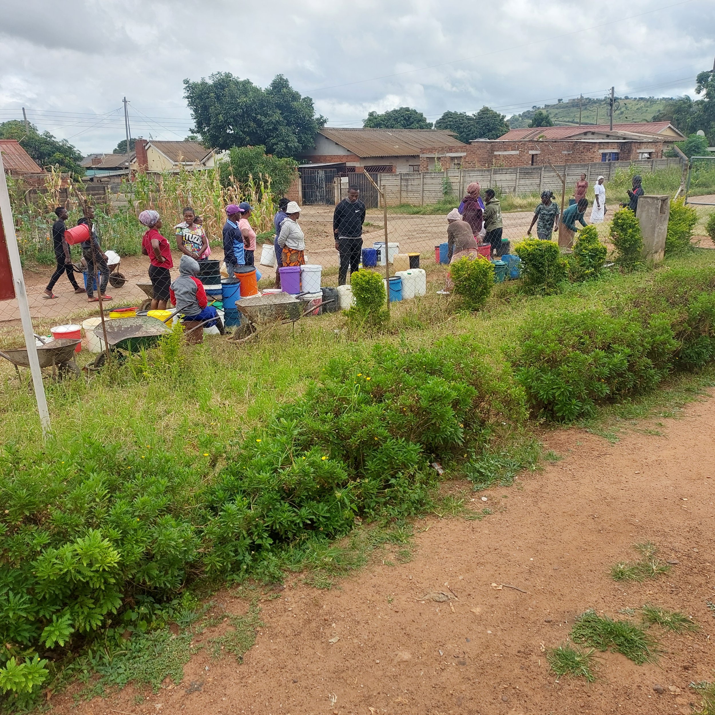 People from the community fetching water.jpg