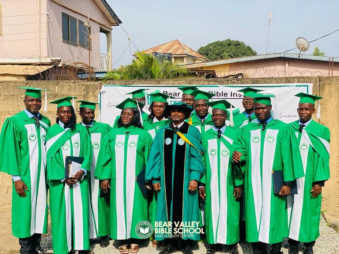 Graduate with director.jpeg