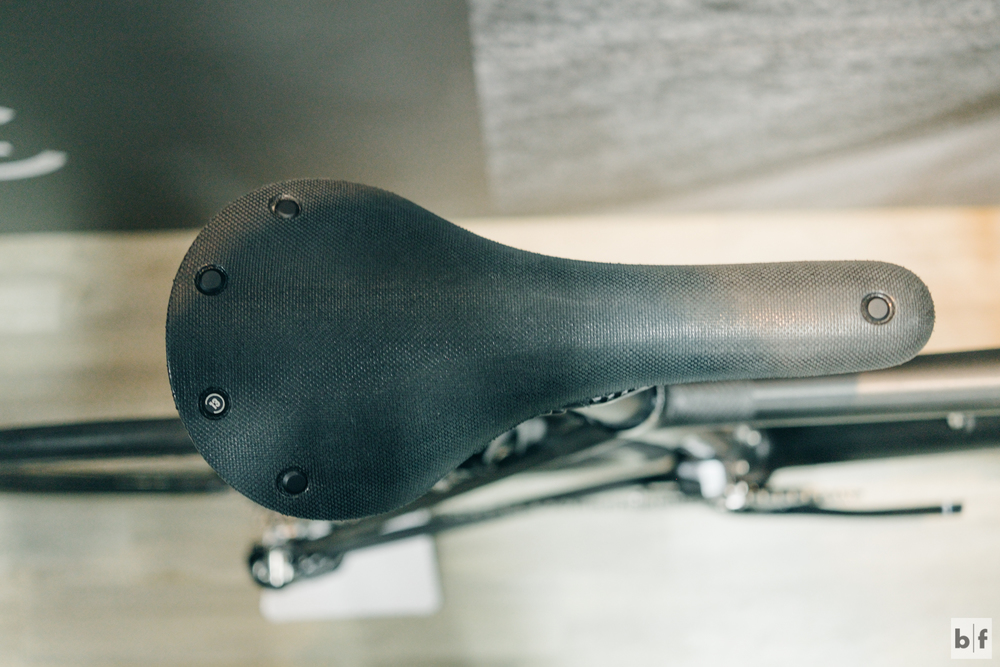  here's another product i was really excited to see in person. i knew brooks was going to release a version of its cambium saddle (c13) but i was unprepared when i saw this one had carbon rails. i just wish i was one of the lucky few getting to test 