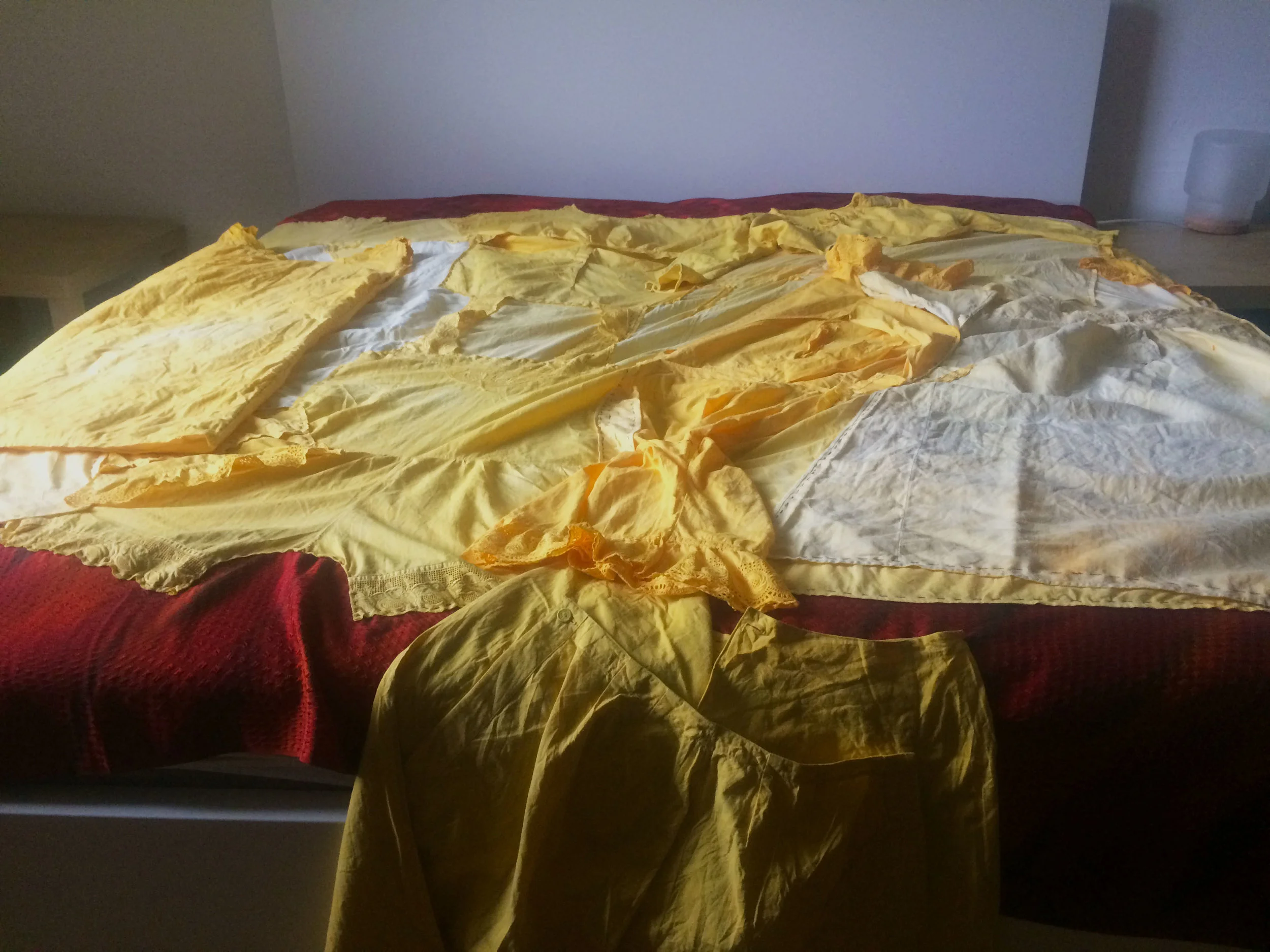 Fugitive dreaming . Three Quilts (Erin Manning and Andrew Goodman). 1. Two-sided, multiple entry-way, hand-sewn quilt with cotton batting. Saffron, hand-dyed, sleepwear 1875-1930, antique Japanese kimono silk (Erin Manning 2017) 2. Two-sided, multiple entry-way, hand-sewn quilt with cotton batting. Indigo, hand-dyed, sleepwear 1875-1930, antique Japanese kimono silk, hand-loomed silk, hand-loomed cotton (Erin Manning 2018) 3. One-sided, hand-sewn quilt with textured apertures. Machine-loomed satin (Andrew Goodman 2018)
