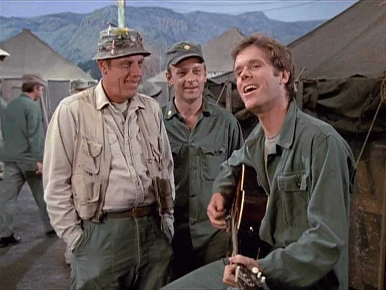 Loudon Wainwright III on the set of M*A*S*H