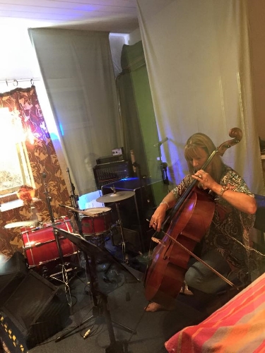 The elegant Sandy Hosking putting her finishing touches on the cello tracks. Fine as a pine lime splice.