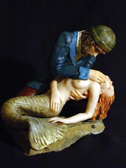 e_sailor_holding_dead_mermaid.jpg
