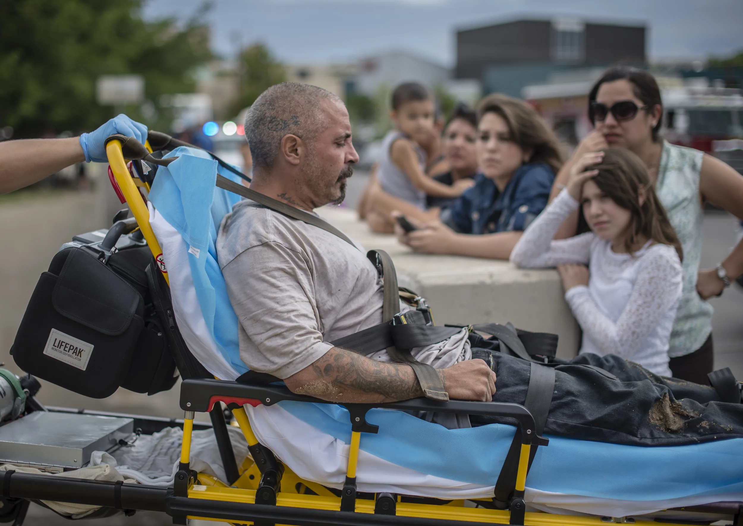 This man was lucky to have survived due to the quick action of the citizens seen on the right who saw the him get swept away.
