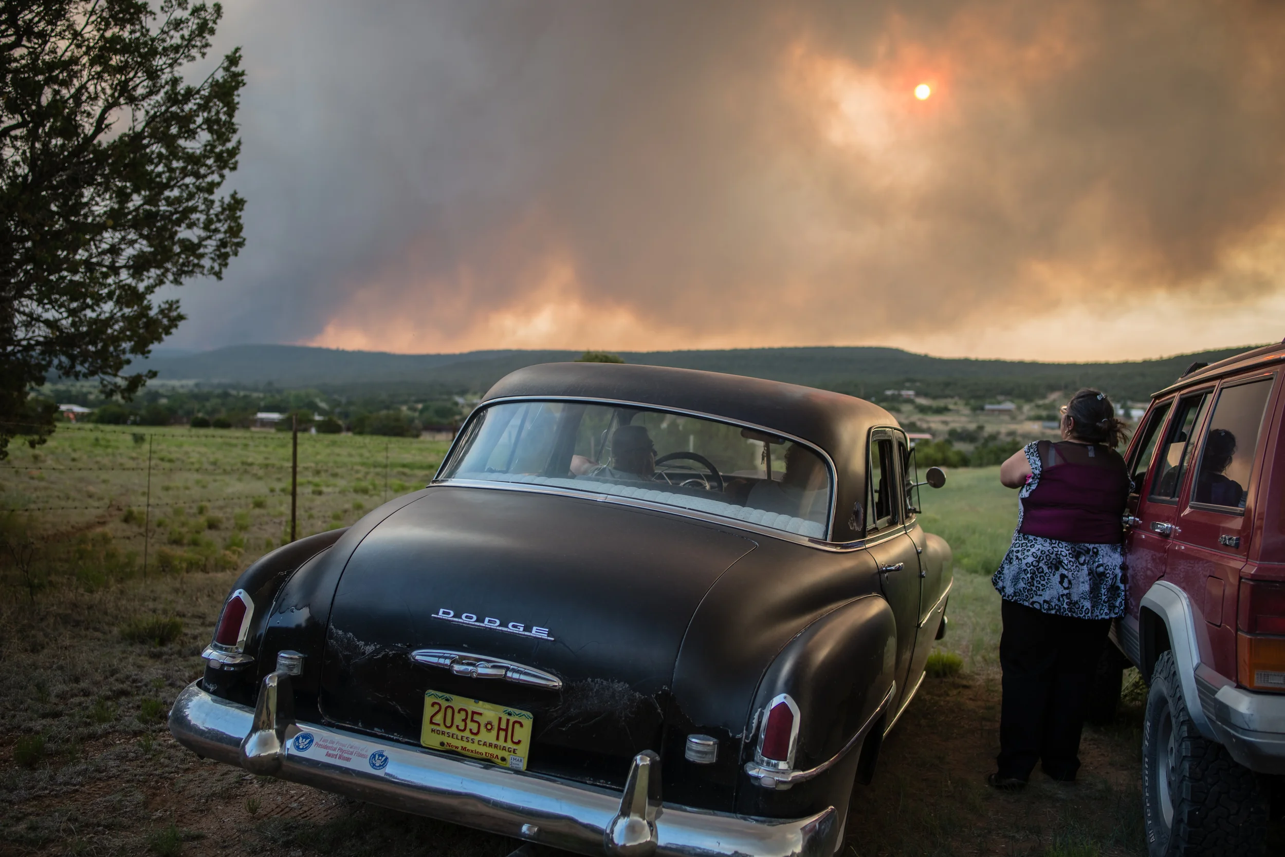 Resident of Chilili watch the Dog Head Fire approach