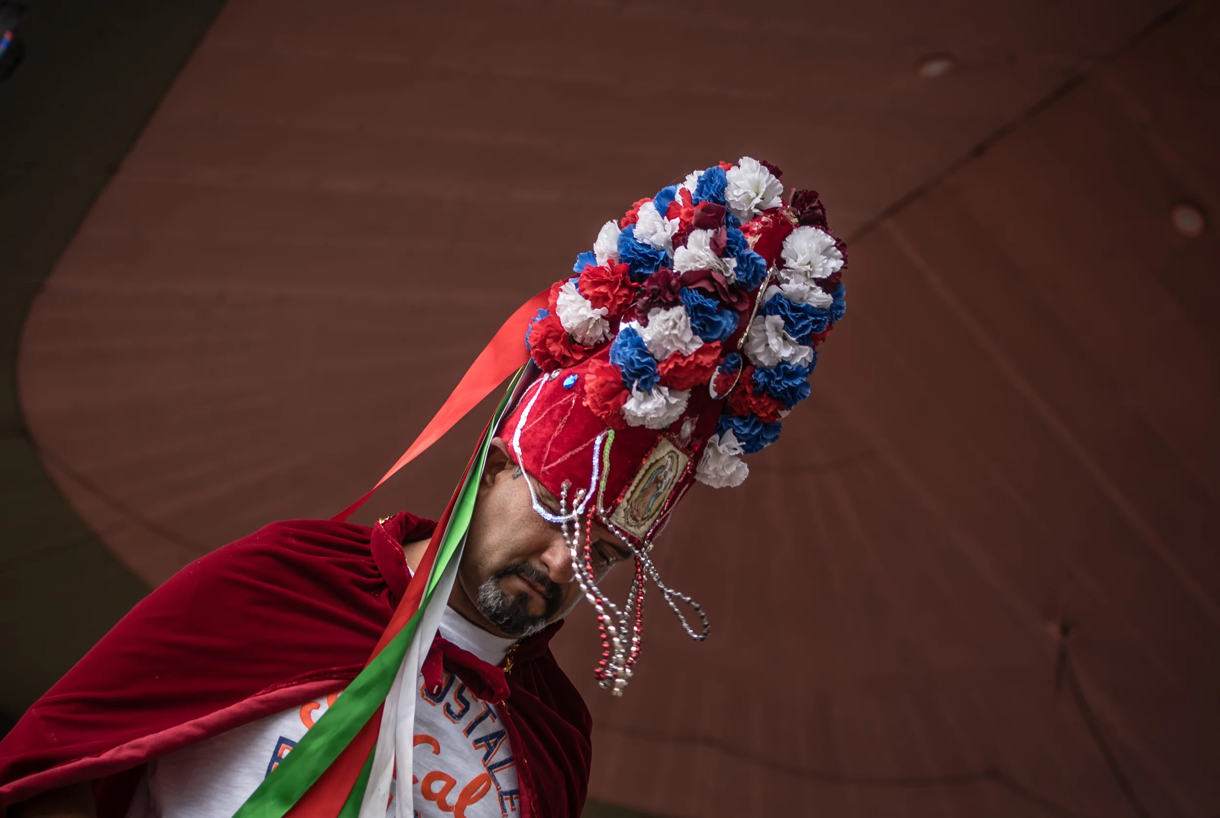 Sergio Castillo performs with the Matachines Cuauhtemoc de Santa Fe for the public Saturday afternoon at the annual Spanish Market in Santa Fe, New Mexico. This is an ancient traditional dance-drama of the Southwest.