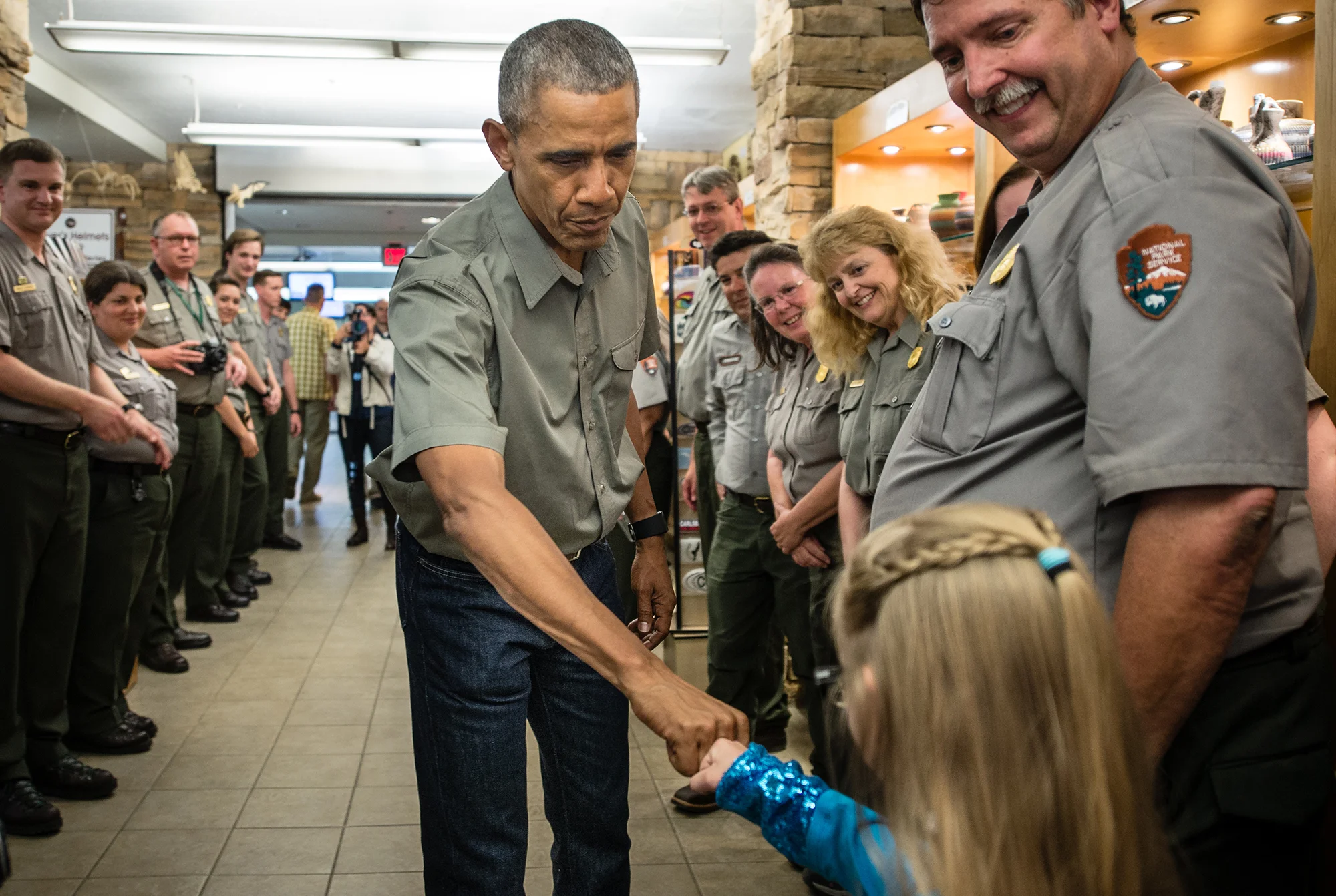 President Barack Obama high fives a young girl during his visit to Carlsbad Caverns in New Mexico on June 2016.