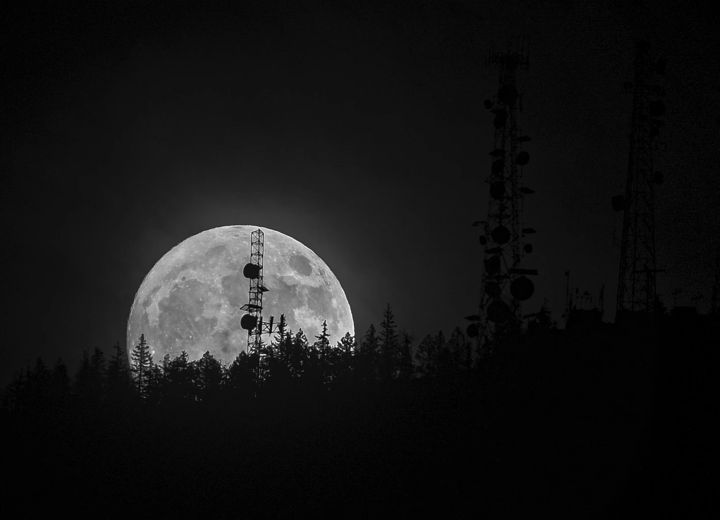 Full moon over the Sandia Mountains