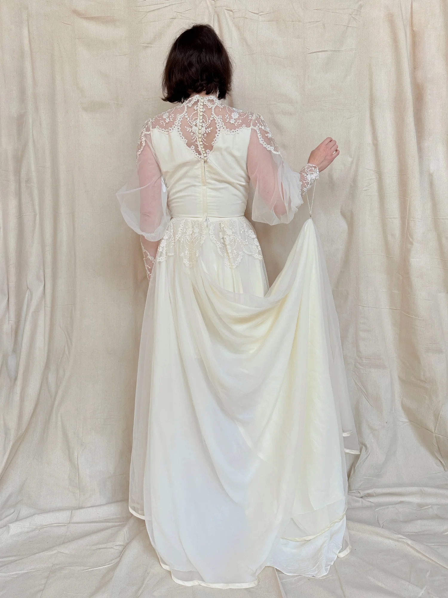 vintage 70s designer wedding dress with train and bishop sleeves — Inherited