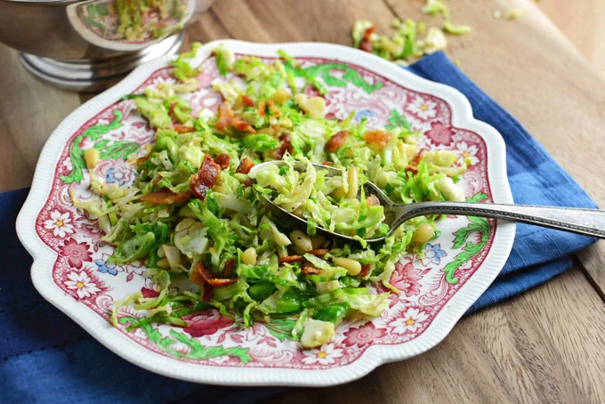 Shaved Brussels Sprouts with Bacon and Pine Nuts