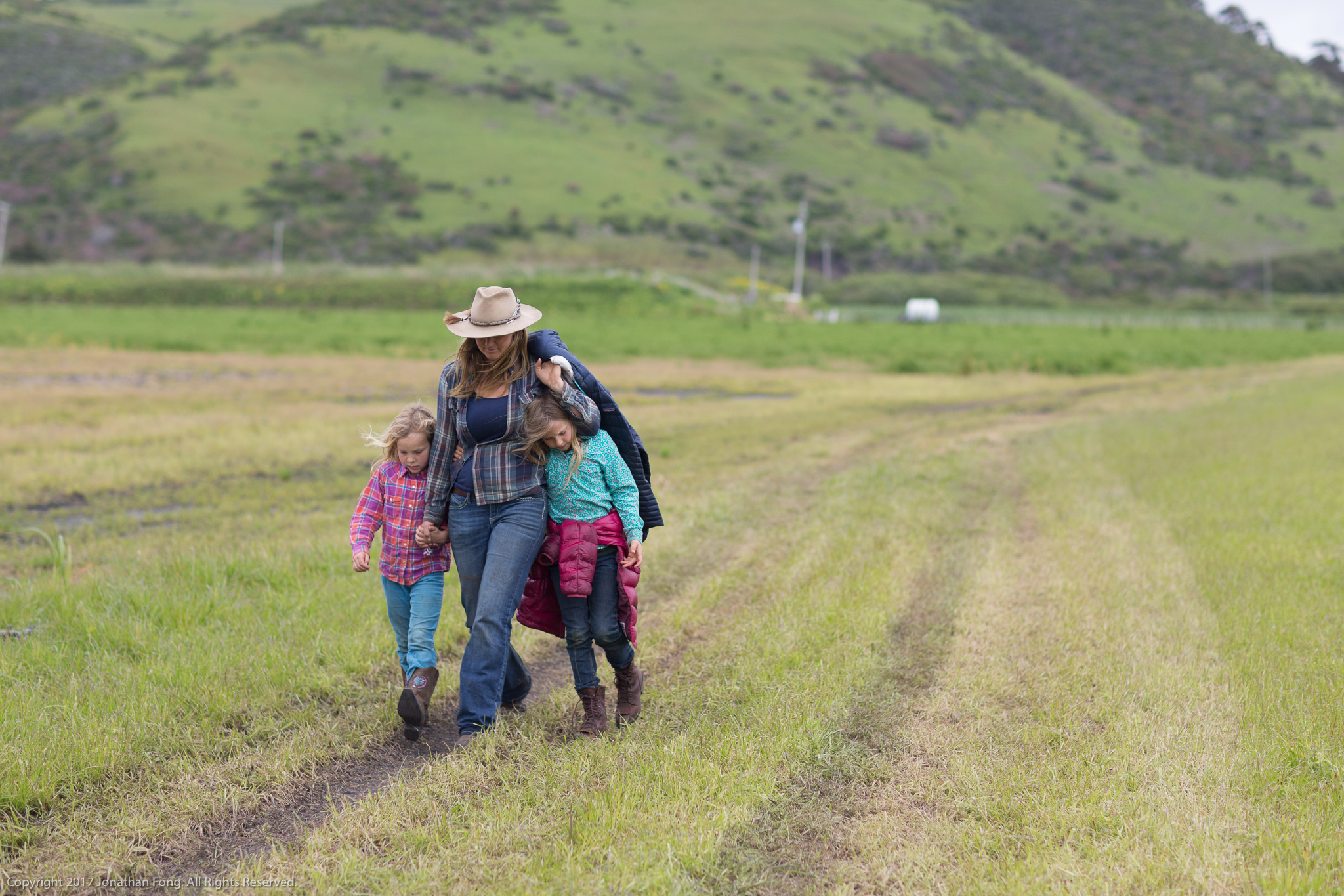 As the day winds down, Doniga shares a quiet stroll back to their home with Quill and Quince. Theirs is a full life -- full of hard work, full of care for the land, and full of love for one another.