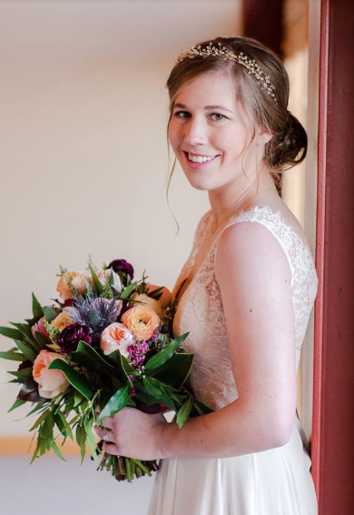  Brittany is wearing a custom Rebecca Schoneveld gown with a Melinda Rose headpiece 