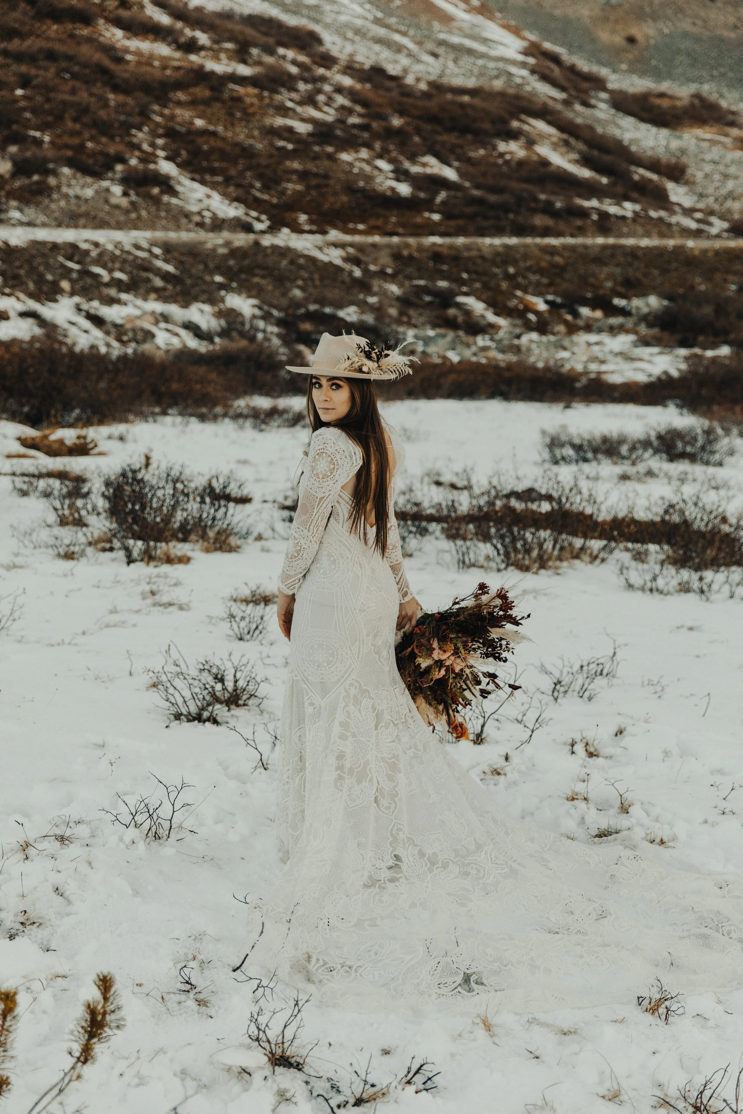 Snowy Winter Elopement Inspiration in Rue De Seine Gown