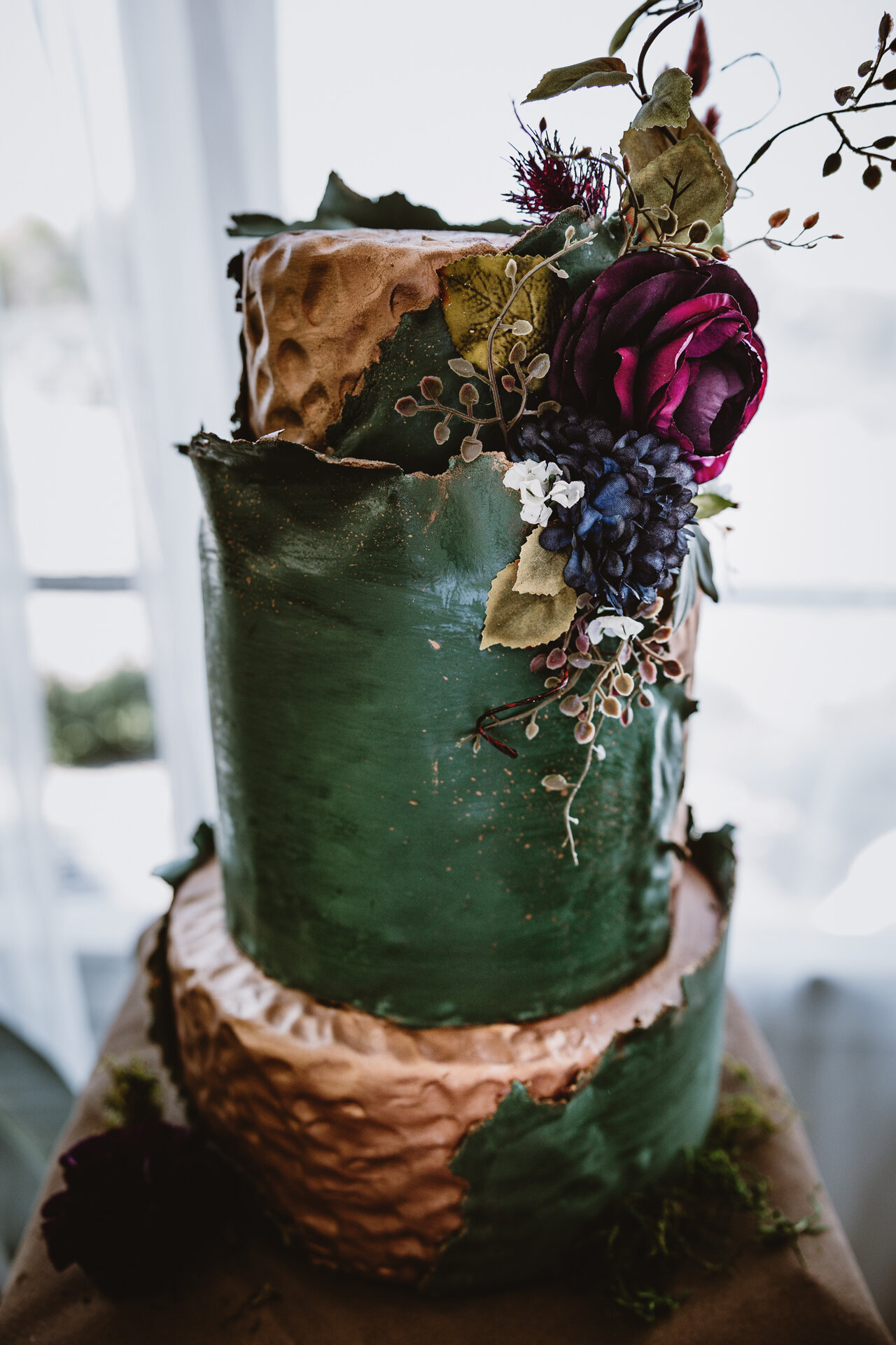  Lush + Leather intimate LGBTQIA+ styled shoot at Denver Photo Collective in the gorgeous Vagabond Zoe wedding gown and Eos cape photographed by Storih Photography 