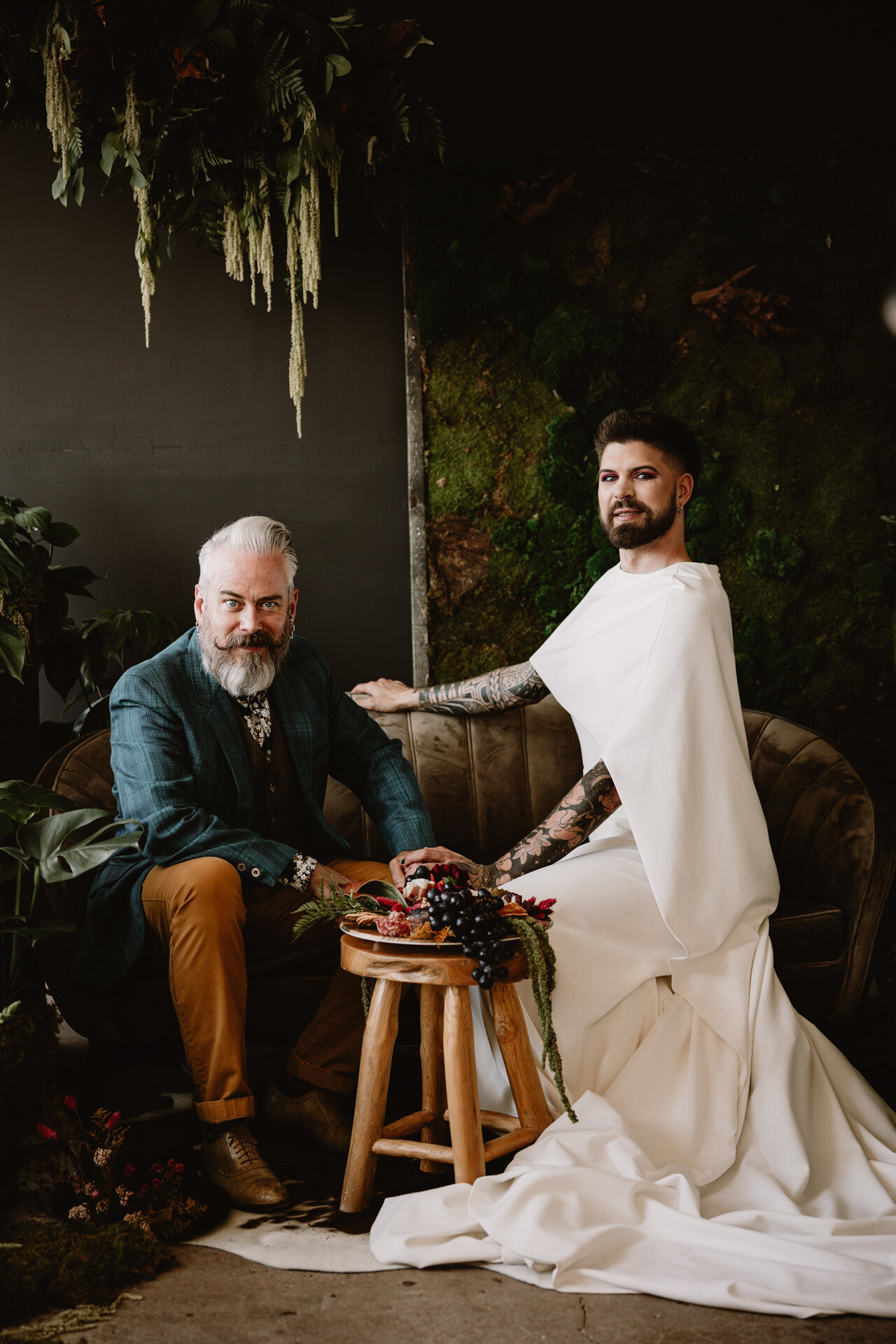  Lush + Leather intimate LGBTQIA+ styled shoot at Denver Photo Collective in the gorgeous Vagabond Zoe wedding gown and Eos cape photographed by Storih Photography 