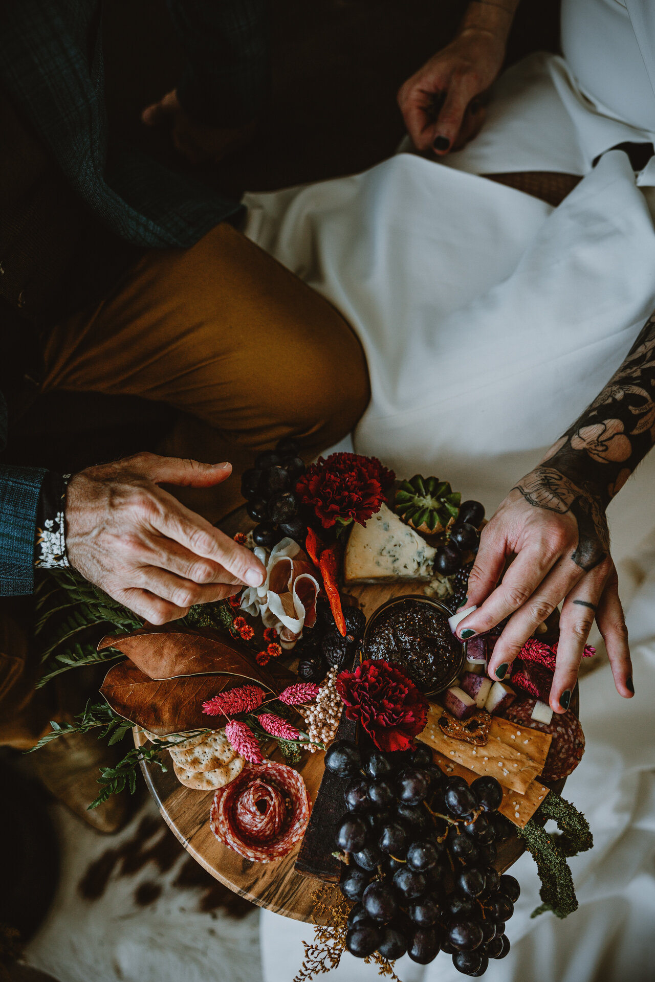  Lush + Leather intimate LGBTQIA+ styled shoot at Denver Photo Collective in the gorgeous Vagabond Zoe wedding gown and Eos cape photographed by Storih Photography 