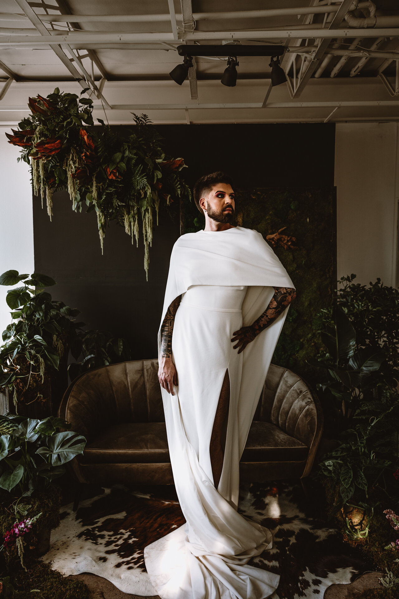  Lush + Leather intimate LGBTQIA+ styled shoot at Denver Photo Collective in the gorgeous Vagabond Zoe wedding gown and Eos cape photographed by Storih Photography 