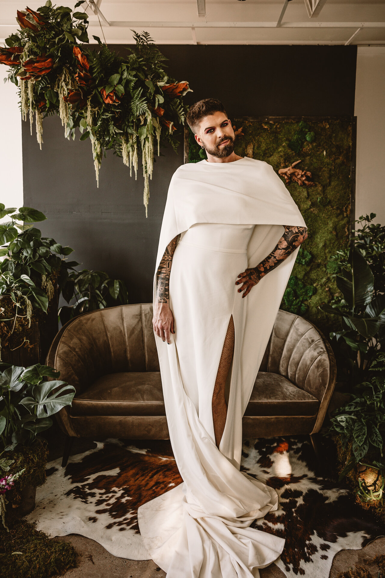  Lush + Leather intimate LGBTQIA+ styled shoot at Denver Photo Collective in the gorgeous Vagabond Zoe wedding gown and Eos cape photographed by Storih Photography 